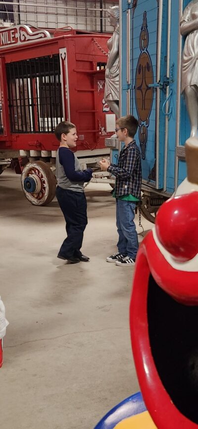 boys playing in the circus museum