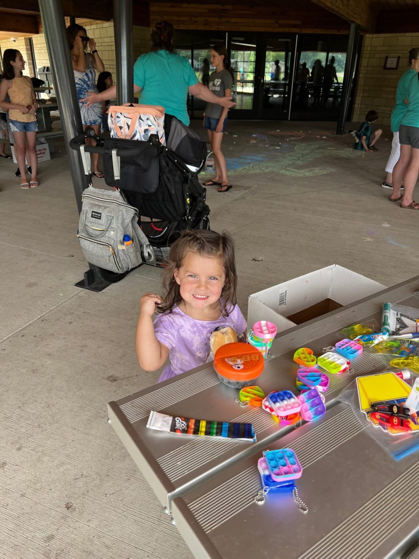 little girl playing with playdoh