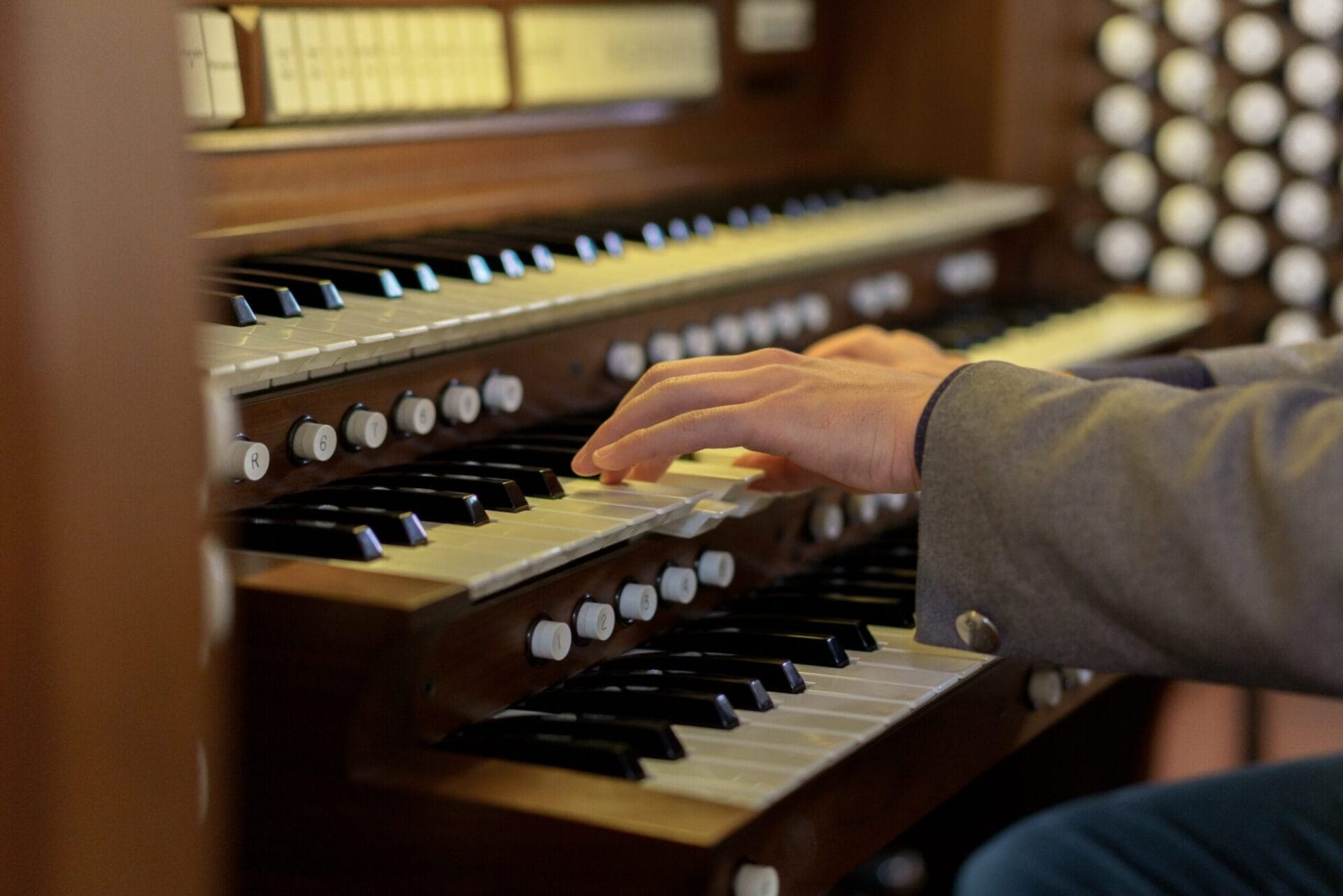 young man playing the organ