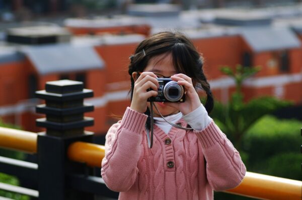 Girl holding a camera
