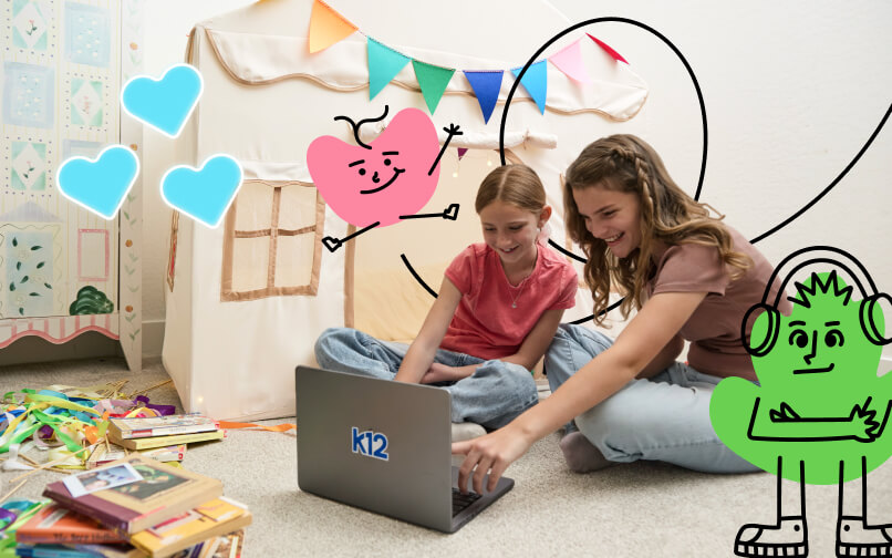 Mother and daughter working together with their laptop
