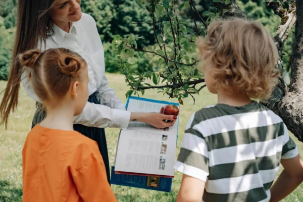 A boy and a girl studying trees